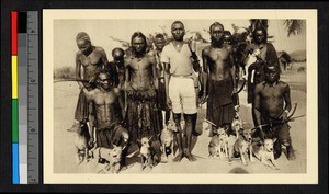 Huntsmen with bows and dogs, Congo, ca.1920-1940