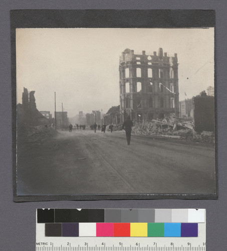 [Ruins along Kearny St., looking north. Telegraph Hill in distance.]