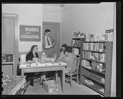 George Hitchcock, Maggie, and two others in California Labor School Library during Cultural Festival