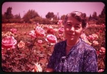 "Margaret Moore in Rose Garden May '57"