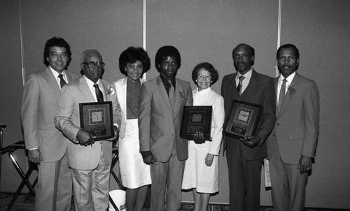 Father of the Year honorees and others posing together, Los Angeles, 1984