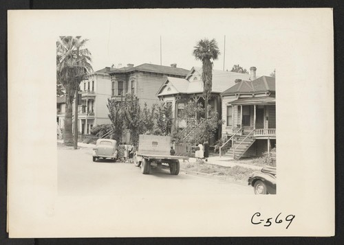 Sacramento, Calif.--Typical homes of residents of Japanese ancestry. Evacuation to assembly centers is due in a few days and preparations are now under way. Photographer: Lange, Dorothea Sacramento, California