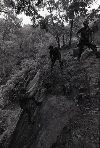 Survival school students learn to rappel, Liberal, 1982
