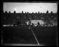 Football mid-play action receiving, U.S.C. vs. Notre Dame at the L.A. Coliseum circa 1928