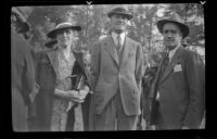 Nellie Hiatt with two men at the Iowa Picnic in Lincoln Park, Los Angeles, 1940