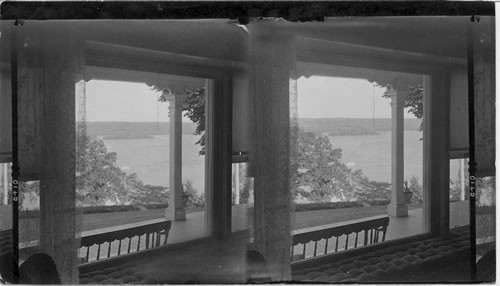 Looking out across the beautiful Hudson from a window seat in Judge Alton B. Parker's summer home, Esopus, N.Y
