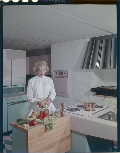 Young and Rubicam kitchen shots. Woman in kitchen