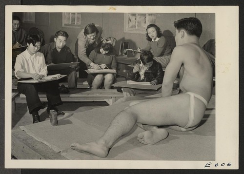 Benji Okuda instructing a life class, an adult night school group at the Heart Mountain Relocation Center. Photographer: Parker, Tom Heart Mountain, Wyoming