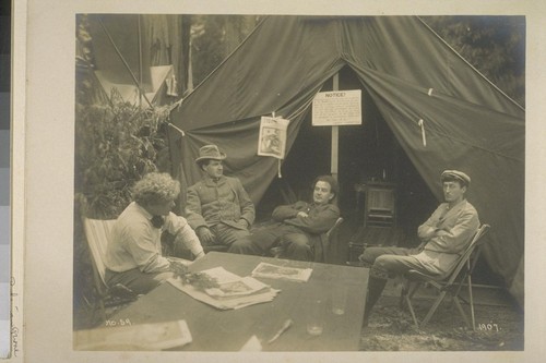 Hopper [second from right]. [Herman George] Scheffauer [second from right]. Sterling [right]. [James Hopper, left?] Bohemian Grove. 1908. [Photograph by Gabriel Moulin. No. 59.]