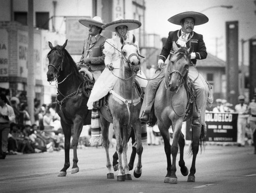 Horse riders in Mexican attire