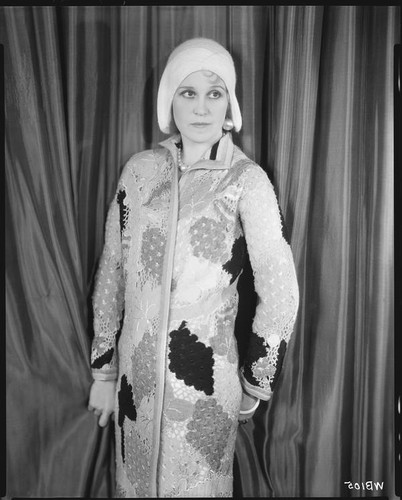Peggy Hamilton modeling a Wanda Kofler crocheted coat, 1930