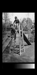 Children playing on slides, Chengdu, Sichuan, China, ca.1945