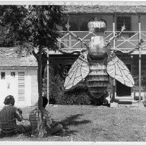 Art by Horst G. Leissl, known for his works of public art. Here, Darrell Forney, left, and Maurice Reed look at a giant fly
