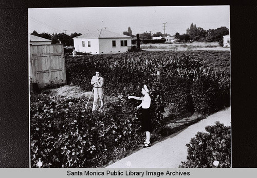 Couple in vegetable garden (Douglas Aircraft Company Employee Housing) Sunset Park, Santa Monica during World War II
