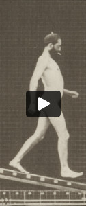 Nude man descending an incline