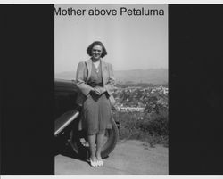 Portrait of Edna Begley with the City of Petaluma in the background, Petaluma, California, about 1939