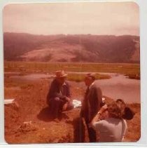 Photographs of Bolinas Bay. Aubrey Neasham being interviewed by man in a suit and a cameraman