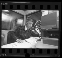 Radio talk show host, Michael Jackson at work in KABC studio in Los Angeles, Calif., 1974