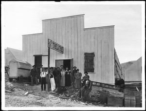 Group of people standing in front of Randsburg's Elite Theater, California, ca.1897-1900