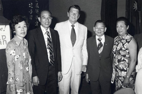 Poy Wong being appointed Overseas Affairs Commissioner. In the photo are Poy Wong and Ronald Reagan