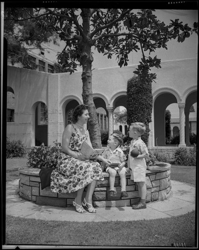 Carl Farnham, Paul Farnham, and woman reading, Lincoln Junior High School, Santa Monica, 1951