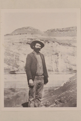 Nat Galloway after he had been through the Canyon. Probably in Glen Canyon about 1898. Taken by dredge crew. Dec. 1899?