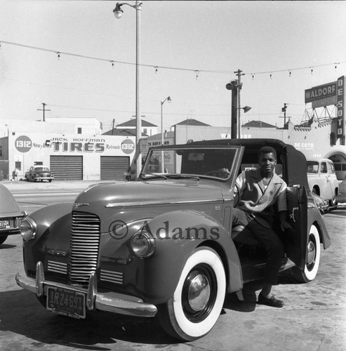 Young man in car, Los Angeles, 1955