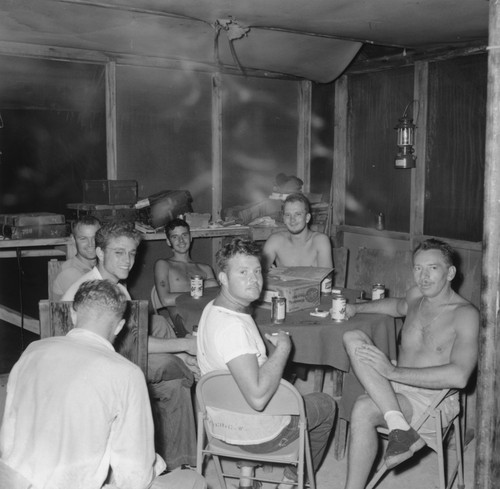 Group socializing during the Capricorn Expedition, Bikini Atoll