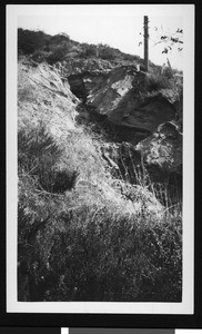 Eroded hillside, showing flood damage to Hollywood Boulevard 550 feet southeast of Kings Road, 1931