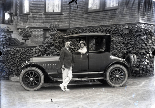 Alfred C. Bach and his wife, Louise, in front of their home in Kentfield, Marin County, California, circa 1922 [photograph]