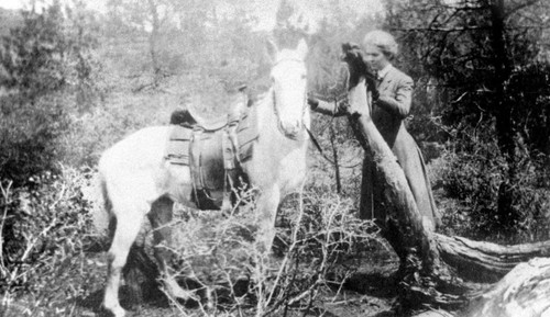 Alice Anderson and horse during trip through Trinities