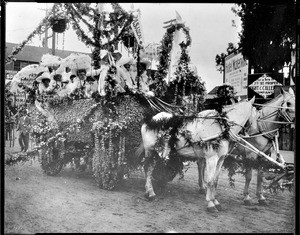Pasadena Neigh (High?) School float at the La Fiesta Parade in Los Angeles, ca.1906