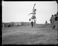 University of California athlete performing a long jump, Los Angeles, 1932