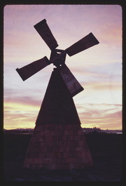 DEC77P2-8: windmill sculpture at sunset