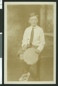 Young boy posing, ca.1920