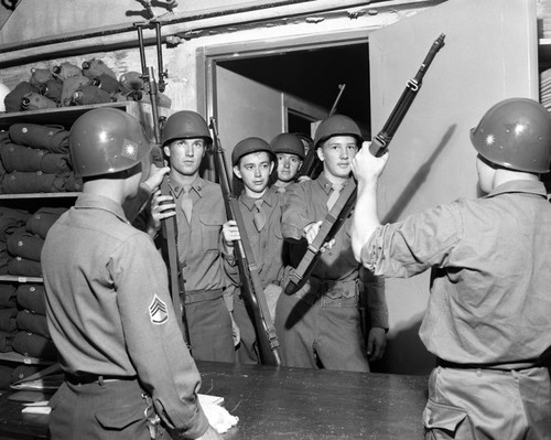 Weapons being issued to members of Company K, California Army National Guard, Anaheim, August 8, 1950