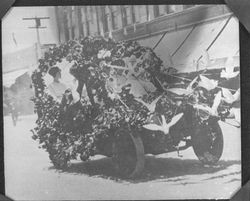 Car decorated with flowers and white doves in the Rose Parade, Santa Rosa, California, 1911
