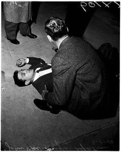 Unidentified burglar suspect shot by police, 1958