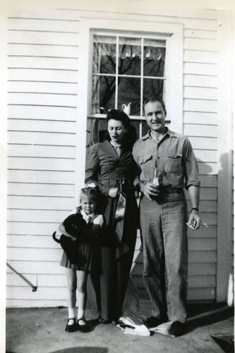 Nancy Swenson Williams with her parents in Paxton, Illinois