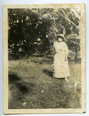Pearl Roberts standing in sister's yard Farmersville, California