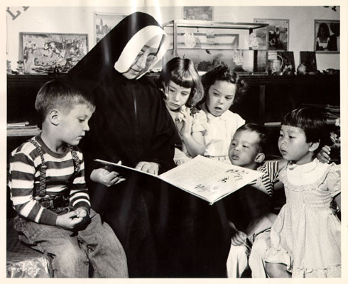 [Story hour at the Holy Family Day Home]
