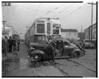 F.C. Damianovich's car hit by Key Route train, Twenty-sixth and Poplar Streets