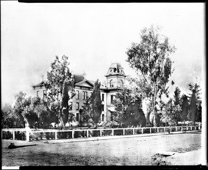 Exterior view of Saint Vincent's College (later Loyola University), Broadway west on 6th Street, Los Angeles, ca.1885