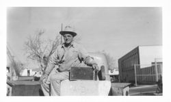 Man with the Petaluma High School cornerstone, Petaluma, California, about 1965