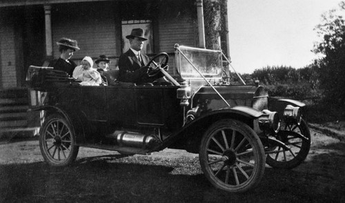 Charles Vance family in their automobile, 1917
