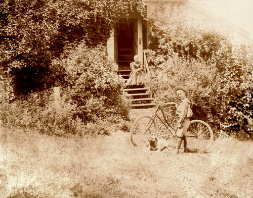 Boy with bicycle