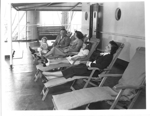 "JEFFERSON sun deck. Jul. 10 1948" Same sequence as S-039 (Alexa Palmer in foreground deck chair)