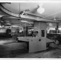 Interior view of the Slicing and Wrapping room for Old Home and Betsy Ross Bread for Pioneer Baking Company