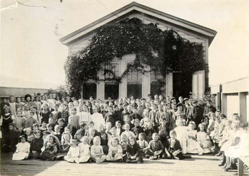 [Students posing outside of the first Visitacion Valley school]
