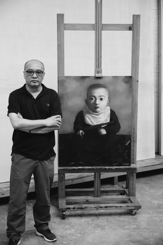 Zhang Xiaogang in his Beijing studio 2 of 2